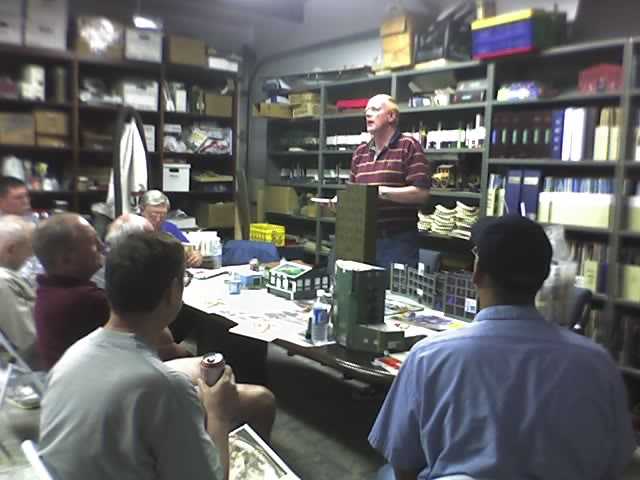 John Christiansen gives a clinic on kit-bashing buildings to APN members