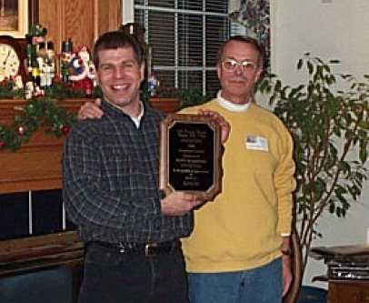 Scott Kurzaski receiving the 2002 APN President's Award from Steve Hashagen